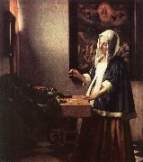 Jan Vermeer Woman Holding a Balance painting